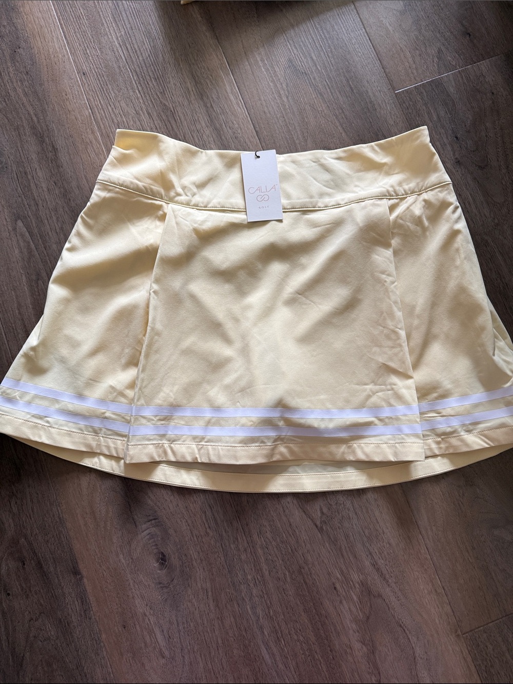 CALIA Golf by Carrie Underwood Panna Cotta Yellow Skort with White Stripes